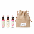 There are three dropper bottles with essences from left to right:  Bach™  Original Flower Remedies Elm, Bach™  Original Flower Remedies Rock Rose and Bach™  Original Flower Remedies Oak. Next to the last essence  there is a burlap bag with the Bach™  logo on it.