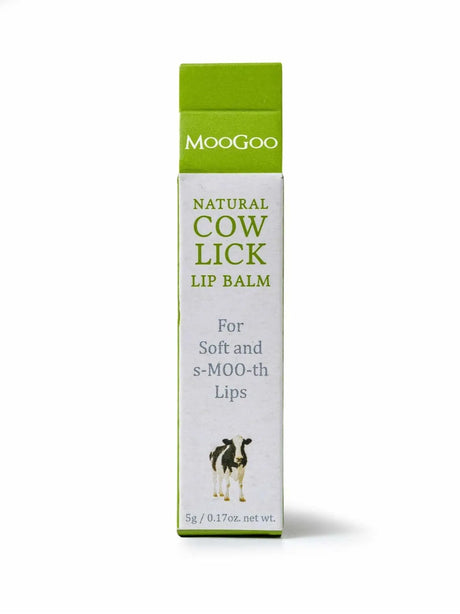 White Carton box packaging  front label reads "MooGoo  (in a green background) Natural Cow Lick Lip Balm for soft and s-MOO-th lips, follow by an illustration of a cow, 5g/ 0.17 oz. net wt".
