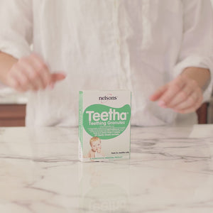 Video of a woman opening a sachet of Nelsons Teetha Teething  Granules